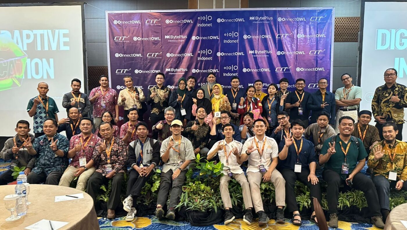connectOWL team with partners and participants at a community event